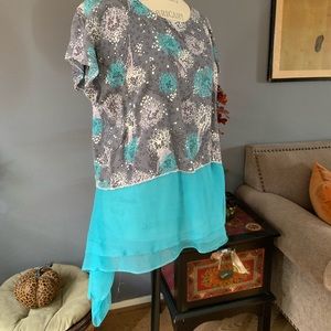 Beautiful hand sewn tunic, by local artist, using vintage French silk material.